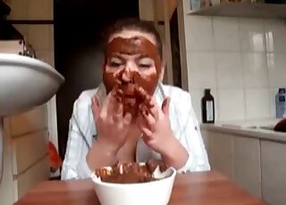 Serving herself a dine plate of warm scat