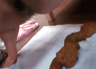 Mature Asian taking off her clothes and showing off