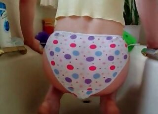 Girl playing with her pants and lots of shit